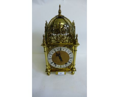 A 19th Century brass lantern clock  complete with pendulum and wall bracket shelf, 19 x 43cm 