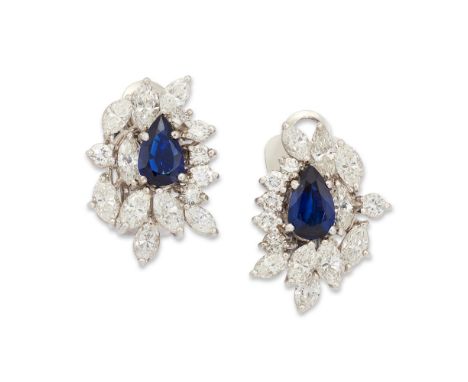 A pair of sapphire and diamond earclips, each composed of a central pear-cut sapphire, within marquise-cut and brilliant-cut 