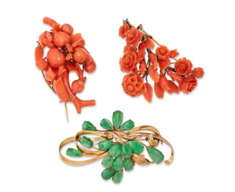 A group of three brooches,&nbsp;comprising: two mid 19th century carved coral&nbsp;(corallium rubrum)&nbsp;brooches, one desi