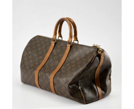 Louis Vuitton. Keepall 45, of monogram canvas with gold hardware, 45 cm width x 27 cm height x 20 cm depth approximately 路易威登