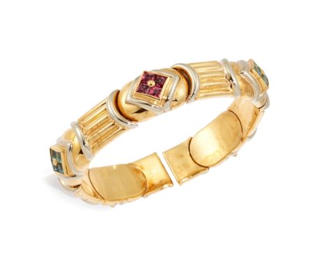 A topaz semi-flexible sprung bangle, of textured geometric design, with square-cut blue and pink topaz accents, Italian assay