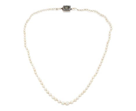A pearl necklace with diamond clasp, the single row of graduated pearls, approximately 3.4 to 7.5mm, strung knotted to an ear