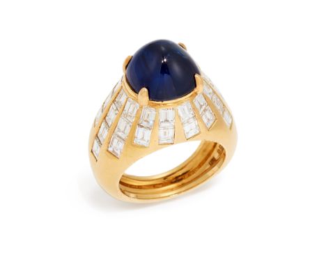 A sapphire and diamond ring, with central claw-set cabochon sapphire, with baguette-cut diamond radiating line surround, to p