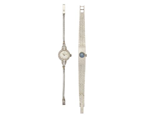 A lot of two ladies cocktail watches Comprising: one platinum and diamond set vertex bracelet watch and a white metal manual 