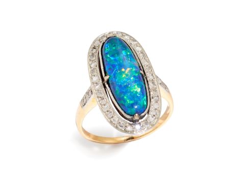 An opal and diamond cluster ring, of oval design, the central black opal collet and claw set, surrounded by rose-cut diamonds