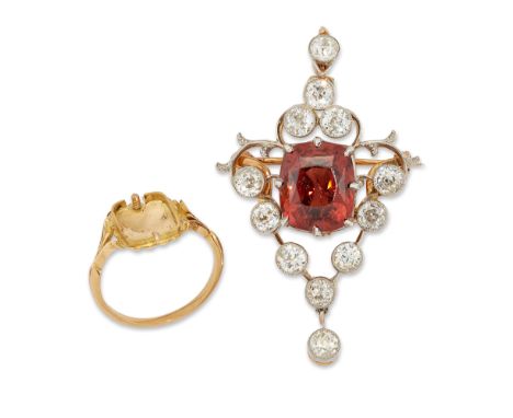 An early 20th century gold and platinum zircon and diamond pendant/brooch with additional ring mount and detachable central p
