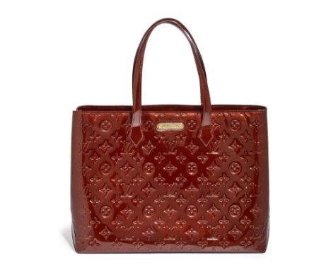 Louis Vuitton. Monogram Vernis 2010, in Rouge patent leatherNotes:Introduced in 1998 under the creative direction of Marc Jac