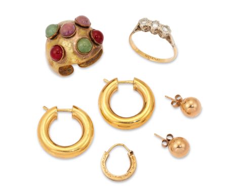 A small group of jewellery, comprising: an 18ct gold three stone diamond ring, ring size P; a pair of 9ct gold hollow hoop ea