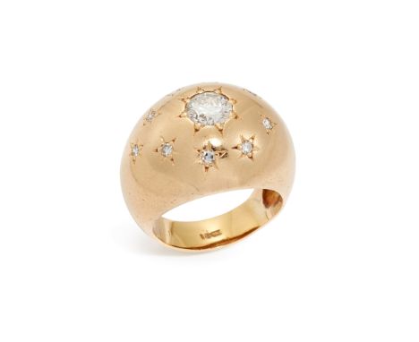 A 20th century diamond bombé ring, composed of a central star-set brilliant-cut diamond, with star-set single-cut diamond sur
