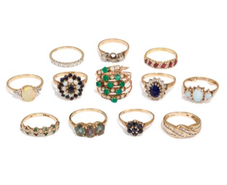 A group of gem-set rings,&nbsp;including: a 9ct gold three stone synthetic opal ring, Birmingham hallmarks; a 9ct gold opal a