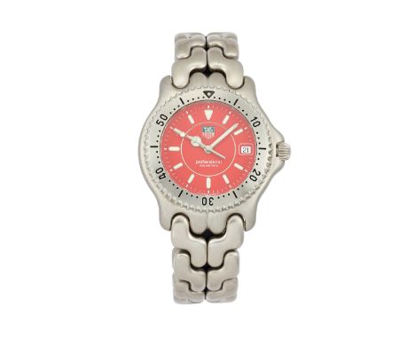 Tag Heuer. A stainless steel quartz bracelet watch  Professional, Reference WG111C, Circa 2000 Quartz movement, red dial with