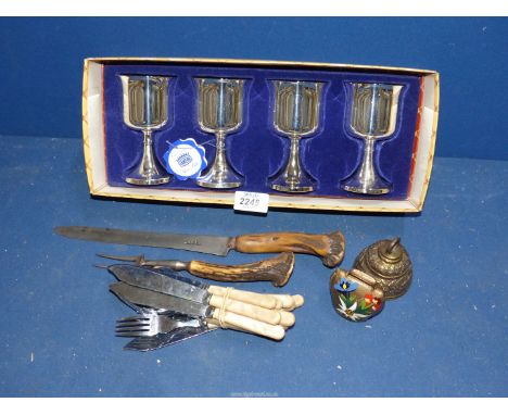 A small quantity of metals including plated goblets, horn handled carving knife and fork etc.