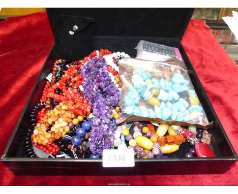 A quantity of semi-precious stone necklaces, some with 925 silver clasps plus a pack of "coloured rocks- moth scale" cards in