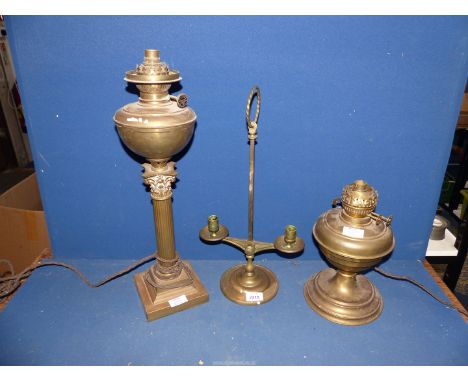 A brass Corinthian column Brass Lamp, 20 1/2'' tall and a small Victorian Brass oil lamp both to converted to electric and a 