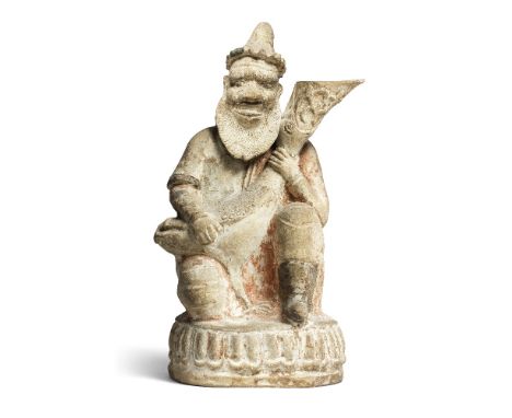 A RARE PAINTED POTTERY MODEL OF A FOREIGN WINE MERCHANTTang DynastyThe bearded Central Asian figure with bushy eyebrows and b