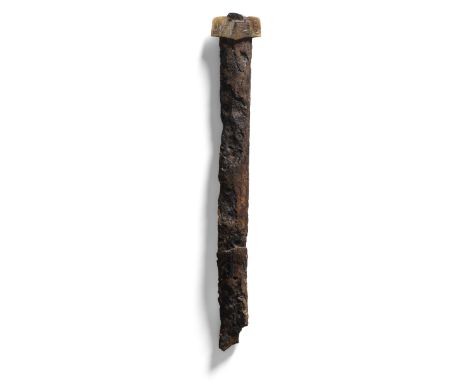 AN IRON BLADE AND JADE GUARDLate Warring States/ Western Han DynastyThe jade guard connected to the remnants of an iron blade