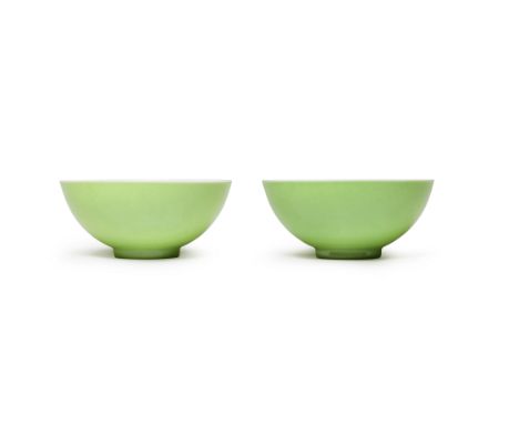A PAIR OF EXTREMELY RARE LIME-GREEN-ENAMELLED BOWLSYongzheng six-character marks and of the period Each bowl with delicately 
