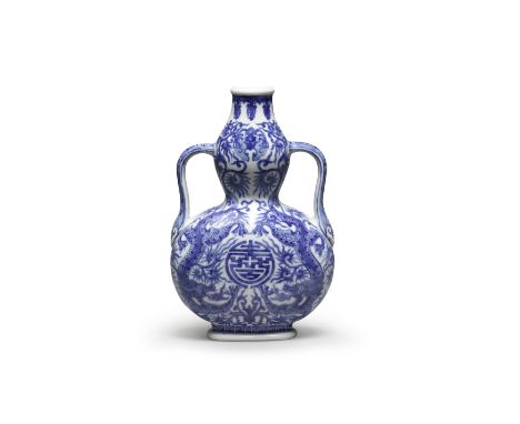 A BLUE AND WHITE DOUBLE-GOURD 'DRAGON' VASEQianlong seal mark and of the periodThe vase slightly flattened, the lower bulbous