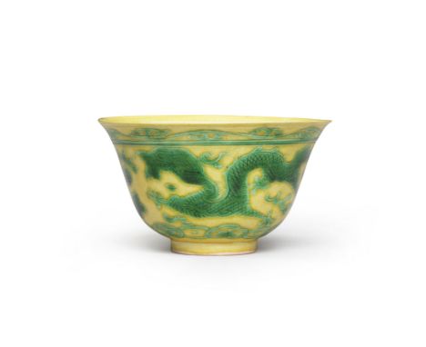 A SMALL GREEN AND YELLOW 'DRAGON' BOWLKangxi six-character mark, Qing dynastyThe exterior with two green striding five-clawed
