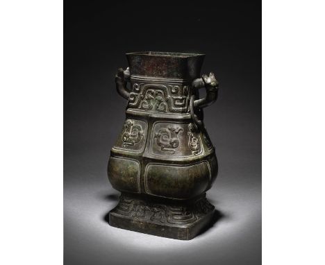 AN IMPORTANT AND RARE MONUMENTAL ARCHAISTIC BRONZE RITUAL WINE VESSEL, FANG HU Song/Ming Dynasty The imposing vessel of oblon