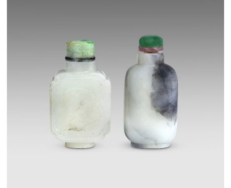 A GREY JADE SNUFF BOTTLE AND A WHITE JADE 'QUAIL AND MILLET' SNUFF BOTTLE18th/19th century The grey snuff bottle raised on a 
