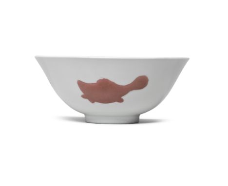 A COPPER RED 'THREE FISH' BOWLYongzheng six-character mark and of the periodThe vessel elegantly potted with deep rounded sid