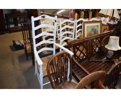 Five white painted ladder back and rush seated chairs