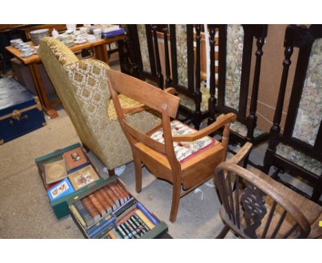 An early 20th Century mahogany commode chair