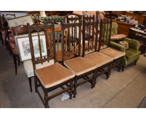 A set of six Ercol dining chairs and a kitchen chair
