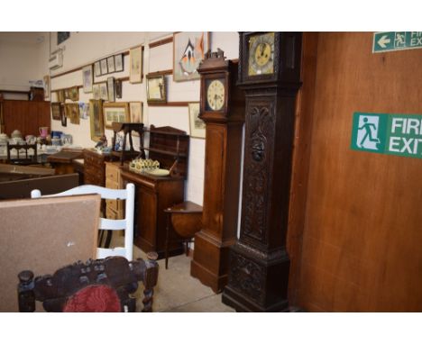 A 19th Century oak long case clock, with 30 hour movement and painted dial by Champion of Wymondham