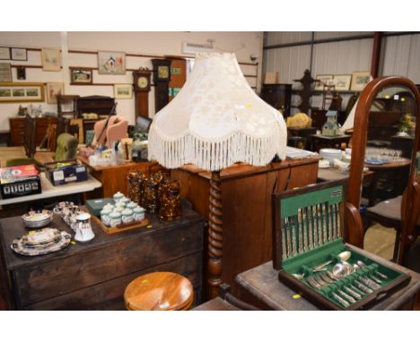 An oak barley twist standard lamp and shade
