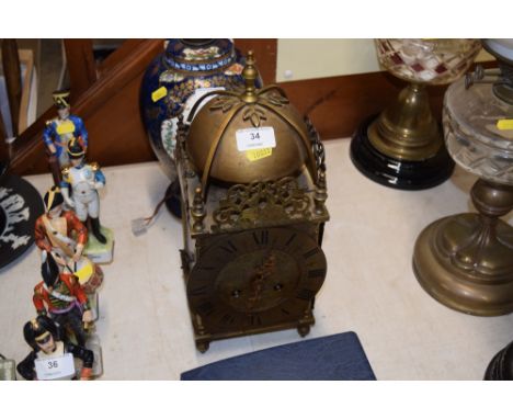 A 17th Century style brass lantern clock `