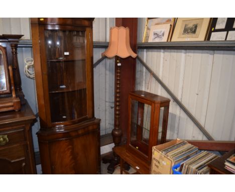 An oak bobbin turned standard lamp and shade