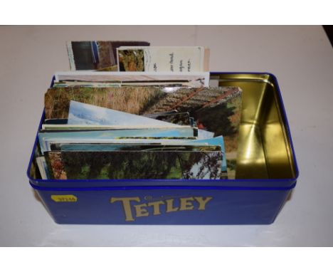 A tin of mostly modern post-cards 