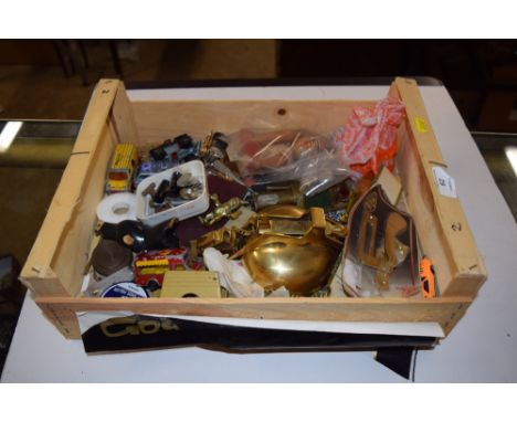 A wooden box of various sundries, to include brass items, a large door knocker, spoons etc. 