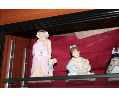 Two Royal Worcester figurines "Katies Day Storytime" and "Katies Day Bathtime"