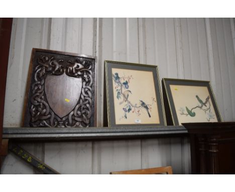 Two framed prints, each depicting birds; together with a wooden shield panel