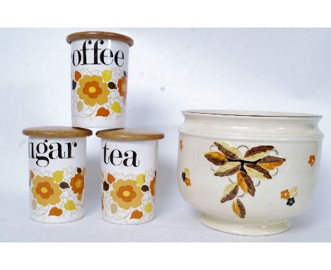 Three retro Crown Devon Tea, Coffee and Sugar storage containers along with a similar design unassociated Myott planter. 20cm