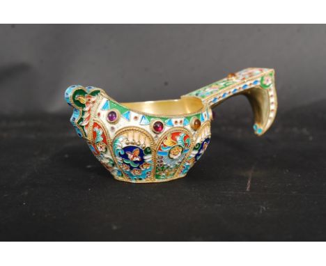 A highly detailed Russian white metal (tested as silver ) and enamel decorated Kovsh. Weight: 98g.