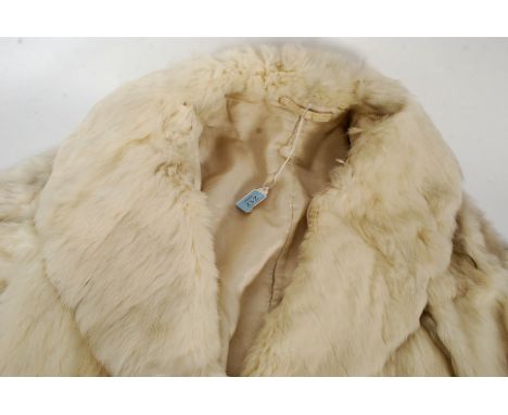 A vintage ladies 1950's white arctic fox ? fur  short coat having lined interior