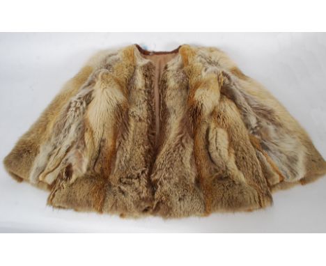 A vintage ladies 1950's fur  short coat having lined interior with original CC41 utility label attached