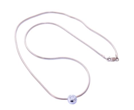 A 9ct gold diamond single stone pendant, the brilliant cut diamond collet with snake link chain, hallmarks for London, estima