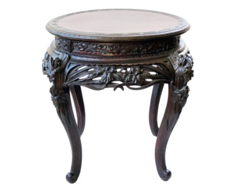 Late 19th century Chinese stained hardwood circular centre table, top with key pattern decoration, carved and pierced frieze 
