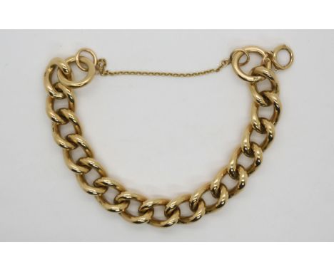 A 9ct chunky curb link bracelet with ring clasp, approx 20cm long, with safety chain, 107.8gms Condition Report:Available upo
