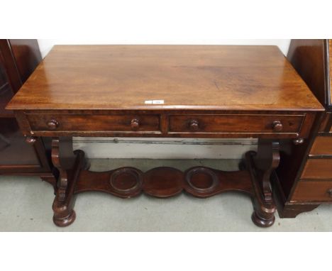 A Victorian mahogany two drawer console table on stretchered base, 76cm high x 114cm wide x 56cm deep Condition Report:Availa