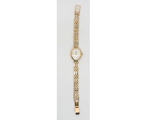 A 9ct gold Rotary ladies watch with oval face, weight with mechanism, 17 gms Condition Report:Available upon request