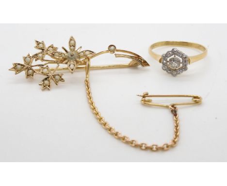 An 18ct diamond cluster ring, size P and a 9ct seed pearl set brooch (missing central pearl) with safety chain, weight togeth