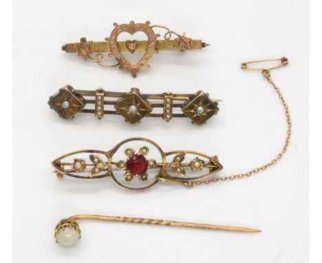 An opal set yellow metal tie pin, a 9ct gold seed pearl set brooch, a Victorian 9ct heart shaped bar brooch and a pearl set y