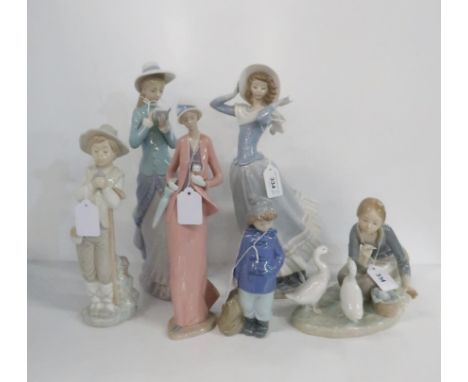 A collection of Lladro and Nao figures of ladies and children Condition Report:boy in straw hat crack to hatAll others ok