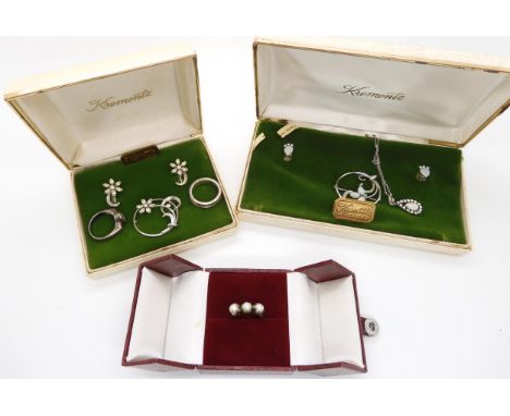 A boxed set of gold plated Krementz opal and gem set jewellery, and a further boxed set of flower jewellery, and other items 